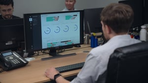 Production manager looking at factory data